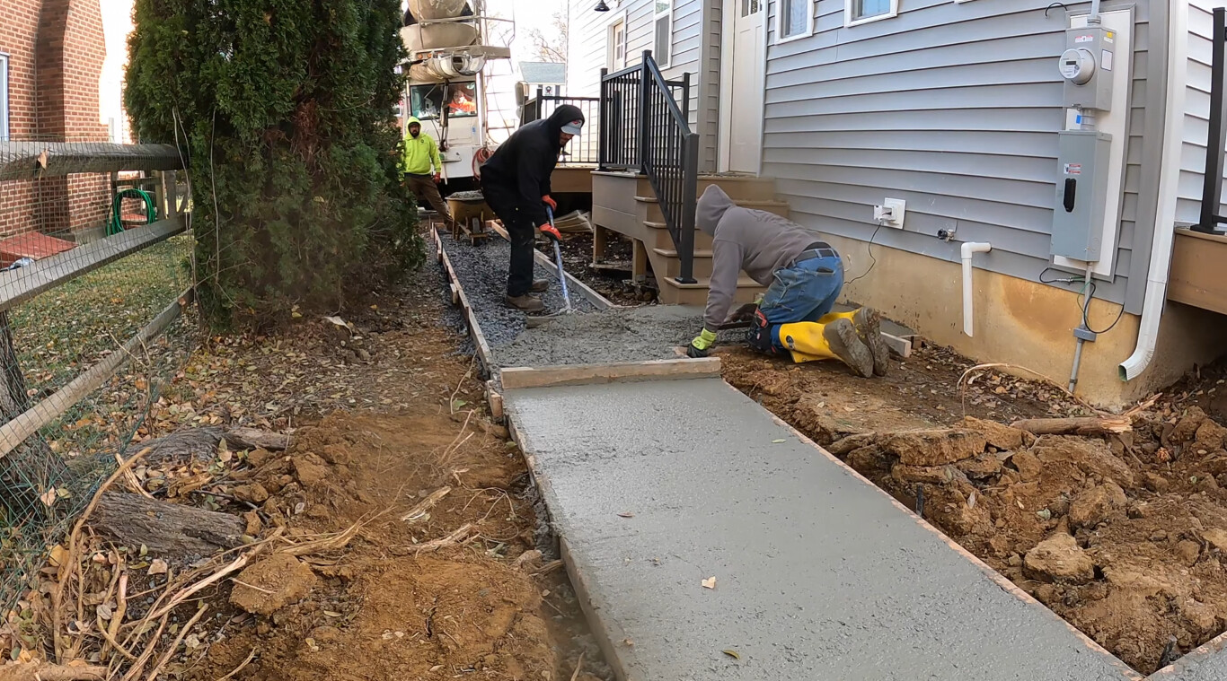 Concrete sidewalk installation in Brockton, MA